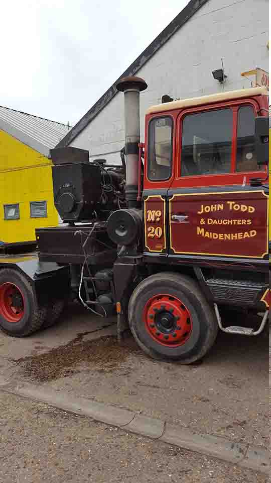 This image shows a black 110kva Generator fitted back to the lorry ready for the customer