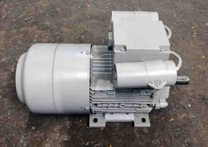 This image is showing a grey motor from the front